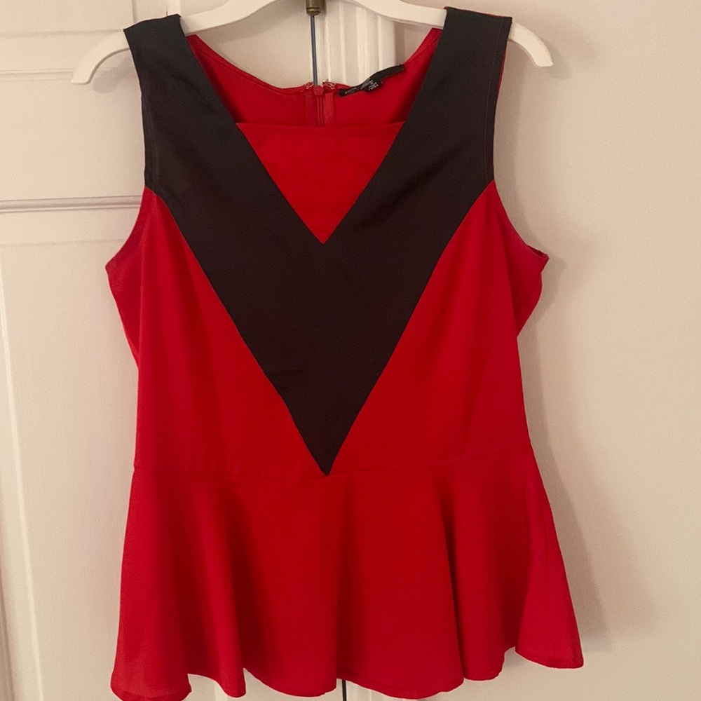 C. Luce silk peplum top size small.